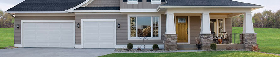 new house with white garage doors 